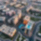 Aerial view of Dubai South showcasing modern architecture and green spaces