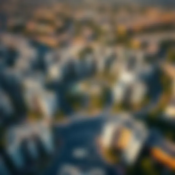 Aerial view of Jumeirah Village Circle showcasing residential buildings and greenery